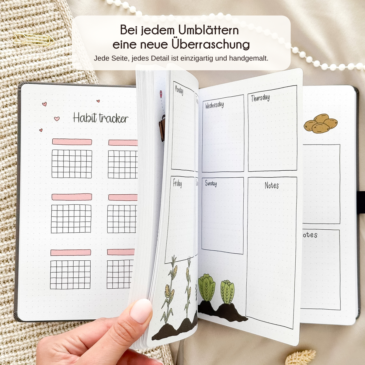 Open Taupe journal showing a hand-drawn monthly page, every page unique